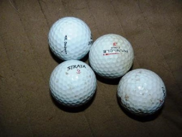 golfové míčky-kompr.
